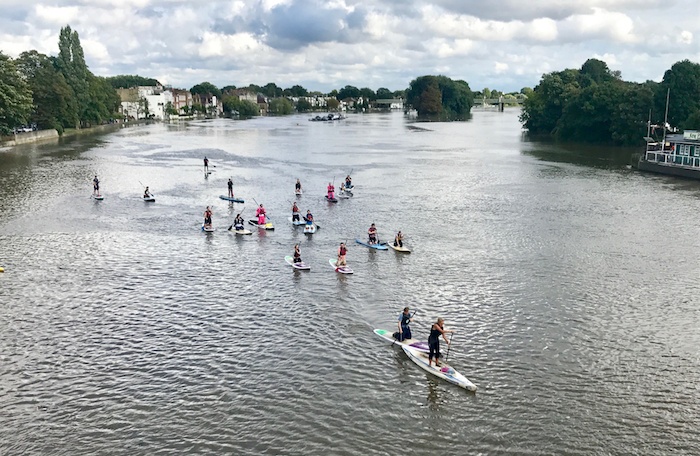 Paddleboarding down the Thames